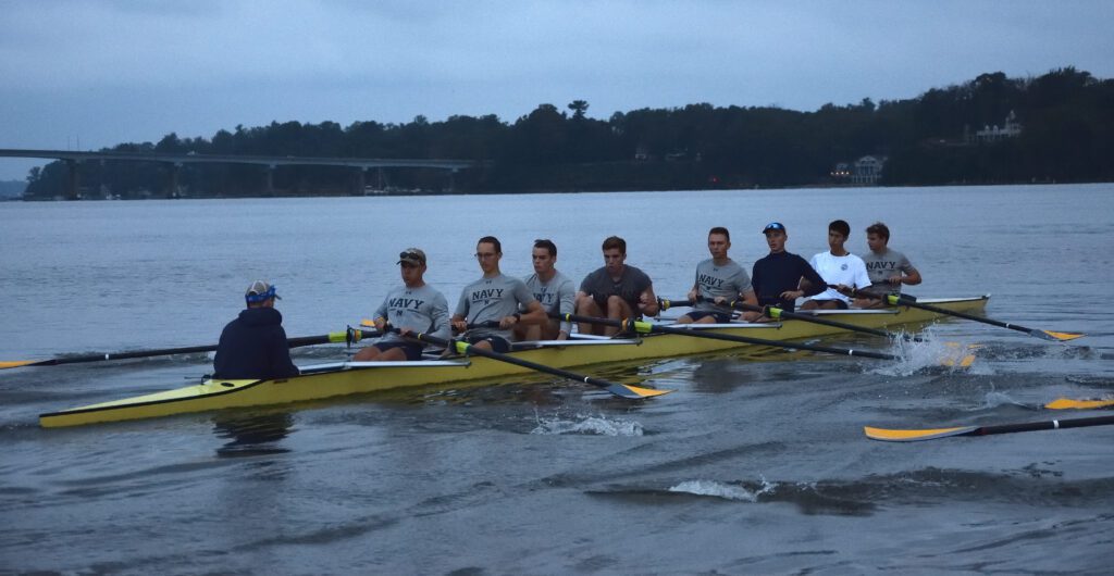 The Navy Lightweight Rowing team gets set for their early morning practice. 