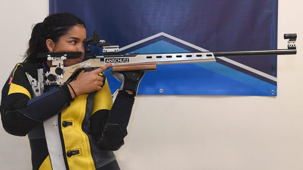 Gabriella Mayes set a new Navy Rifle team record in the air rifle event.