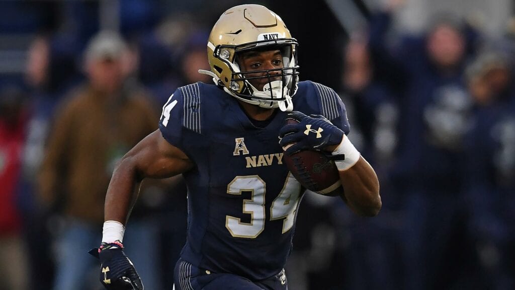 Navy Fullback Jamale Carothers personifies the Mids' "Built Different" persona.
